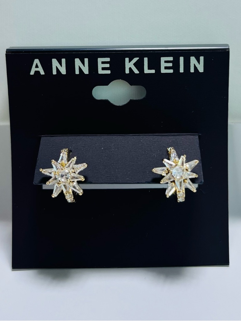 Anne Klein Gold-Tone Small Cubic Zirconia Starburst Hoop
Earrings